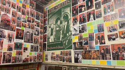 The room inside Salford Lads Club dedicated to The Smiths; the walls are adorned with posters, including a large one of the famous image of the band standing outside the building