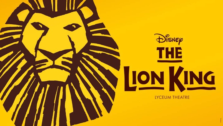 Image of a lion in bright yellow with the words Lion King