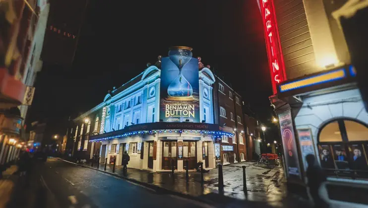 Front The Ambassadors Theatre with sign for the production -  The Curious Case of Benjamin Button