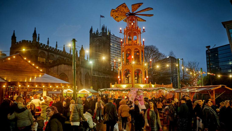 The Christmas market in the gardens of Manchester Cathedral