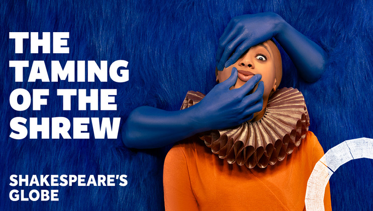 A promotional image for Shakespeare's The Taming of the Shrew at Shakespeare's Globe. It features a person wearing an elaborate ruff and an orange outfit, with blue-gloved hands playfully covering their face against a textured blue background.