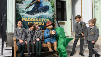 Schoolchildren unveil a statue of Paddington Bear on a bench outside 28 Connaught Street - one of 23 across the country in the Paddington Visit trail which celebrates the release in cinemas of Paddington in Peru