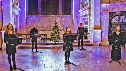 Carol singers in the stage are of St Martin-in-the-Fields church in Trafalgar Square