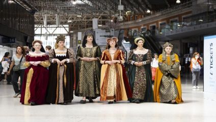 Actresses dressed as the wives of Henry VIII visit Waterloo Station. Photos © David Parry