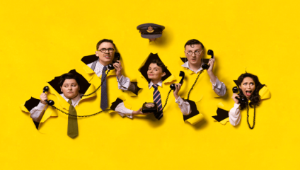 Five individuals in shirts & ties comically poke their heads and hands through a bright yellow wall, talking on old-fashioned black rotary phones. One person holds a captain's hat above another's head. The overall expression is whimsical and lively.