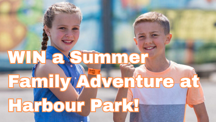 Two children, a girl and a boy, smile and hold up wristbands against a vibrant outdoor background. Overlaid text reads, WIN a Summer Family Adventure at Harbour Park! The scene is cheerful and sunny.