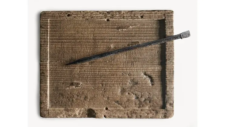 Roman wooden writing tablet and stylus. Credit: London Museum