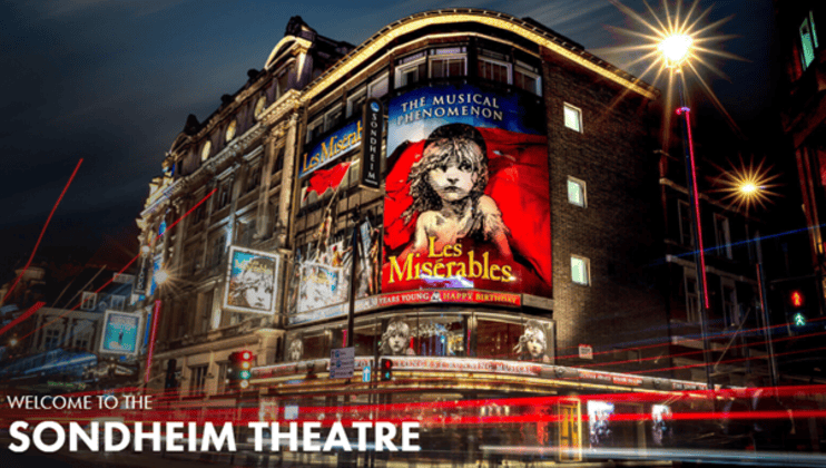 Front of the Sondheim Theatre showing image of Les Misérables